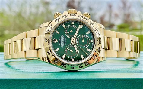 gold rolex watch daytona green|Rolex gold daytona green dial.